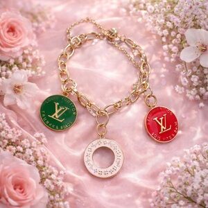 Louis Vuitton charms on an unbranded Bracelet w/ Red, Green, and White Charms